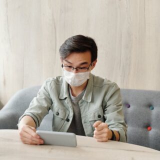 man using his smartphone on video call